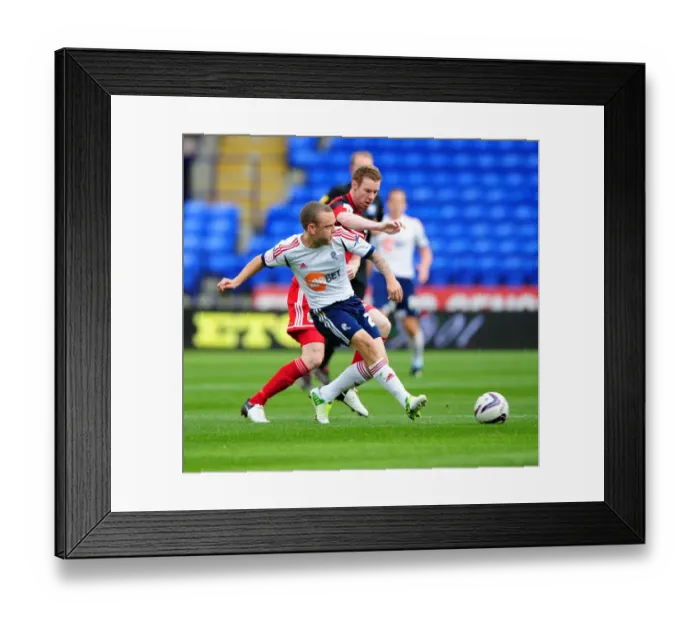 Framed Print : Bristol City's Stephen Pearson vs. Jay Sterling Clash in Championship Match, 2012 Framed Print : Bristol City's Stephen Pearson vs. Jay Sterling Clash in Championship Match, 2012