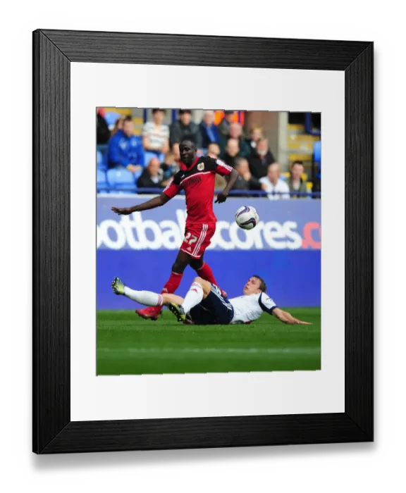 Framed Print : Adomah vs. Warnock: Battle for Supremacy in the 2012 Championship Clash between Bolton Wanderers and Bristol City Framed Print : Adomah vs. Warnock: Battle for Supremacy in the 2012 Championship Clash between Bolton Wanderers and Bristol City