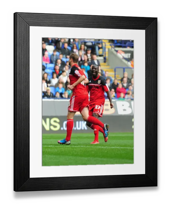 Framed Print : Celebration: Davies and Adomah Rejoice in Bristol City's Goal vs Bolton Wanderers (201012) Framed Print : Celebration: Davies and Adomah Rejoice in Bristol City's Goal vs Bolton Wanderers (201012)