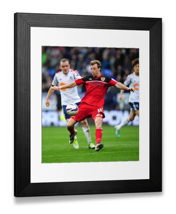 Framed Print : Battling for Supremacy: Martyn Woolford vs. Jay Spearing in the 2012 Championship Clash between Bolton Wanderers and Bristol City Framed Print : Battling for Supremacy: Martyn Woolford vs. Jay Spearing in the 2012 Championship Clash between Bolton Wanderers and Bristol City
