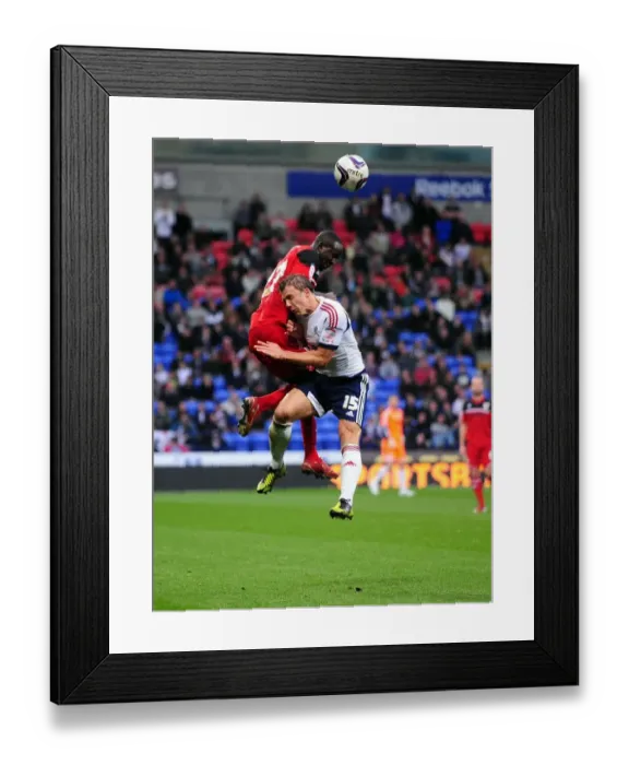 Framed Print : Bolton's Warnock Fouls Albert Adomah of Bristol City - Championship Clash, 2012 Framed Print : Bolton's Warnock Fouls Albert Adomah of Bristol City - Championship Clash, 2012