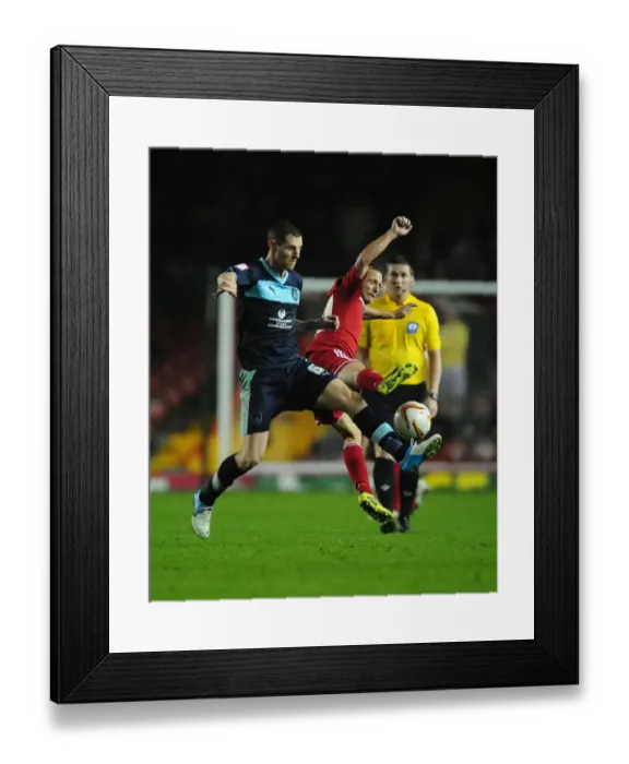 Framed Print : Bristol City vs Burnley: Intense Battle for the Ball between Jody Morris and Chris McCann