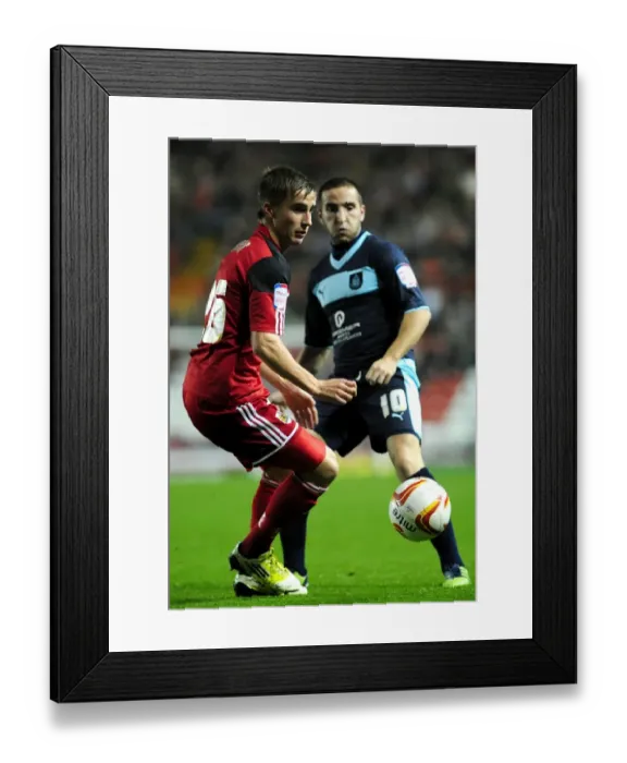 Framed Print : Bristol City vs Burnley: A Championship Showdown at Ashton Gate Stadium - Joe Bryan vs Martin Paterson Framed Print : Bristol City vs Burnley: A Championship Showdown at Ashton Gate Stadium - Joe Bryan vs Martin Paterson