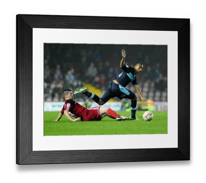 Framed Print : Mark Wilson Tackles Junior Stanislas in Intense Championship Showdown at Ashton Gate Stadium Framed Print : Mark Wilson Tackles Junior Stanislas in Intense Championship Showdown at Ashton Gate Stadium