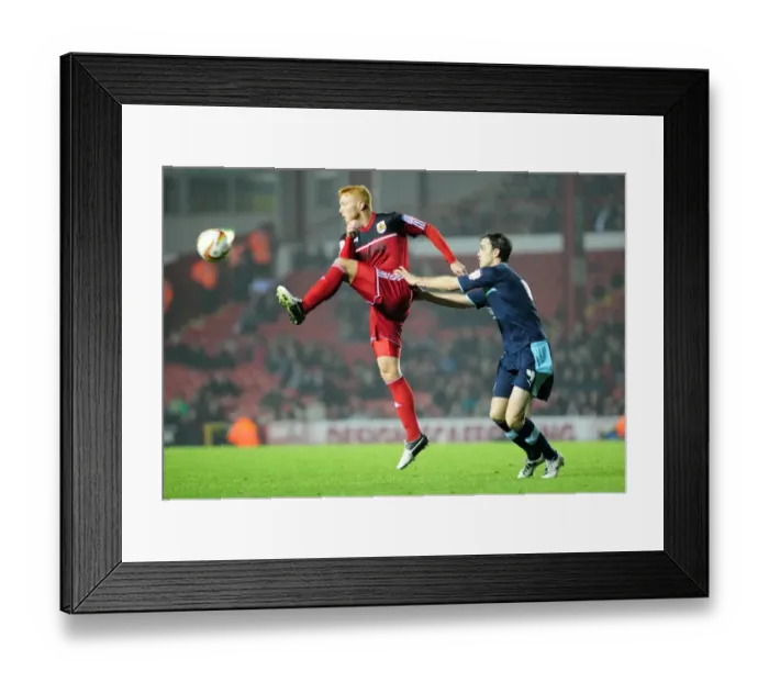 Framed Print : Bristol City's Ryan Taylor Outmuscles Burnley's Michael Duff for the Ball in Championship Clash at Ashton Gate Framed Print : Bristol City's Ryan Taylor Outmuscles Burnley's Michael Duff for the Ball in Championship Clash at Ashton Gate