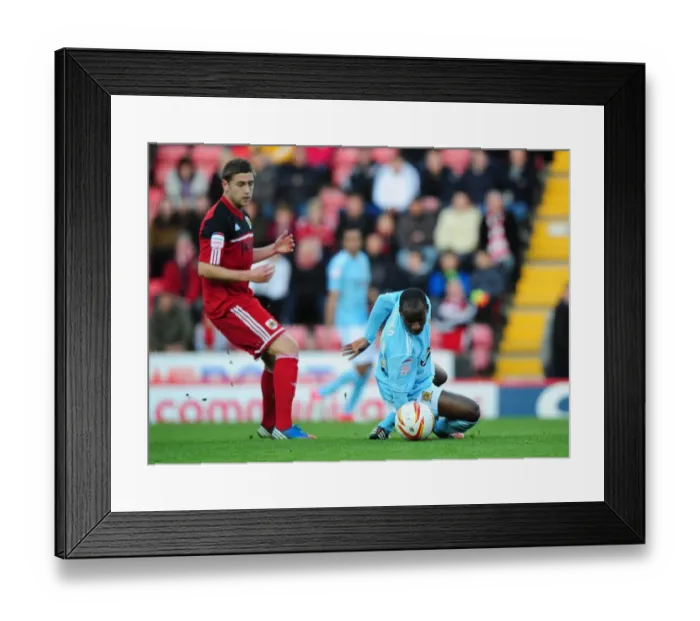 Framed Print : Battling for Championship Supremacy: Davies vs. Aluko