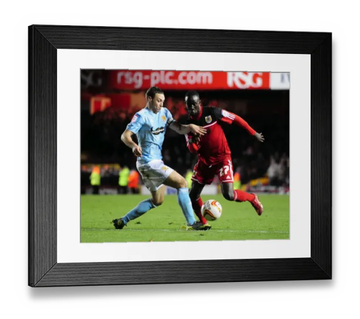 Framed Print : Bristol City vs. Hull City: Albert Adomah vs. James Chester Battle in Championship Match Framed Print : Bristol City vs. Hull City: Albert Adomah vs. James Chester Battle in Championship Match