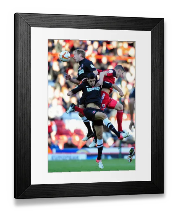 Framed Print : Battling for Supremacy: Wilson vs. Kerkar in the Heights of Championship Football Framed Print : Battling for Supremacy: Wilson vs. Kerkar in the Heights of Championship Football
