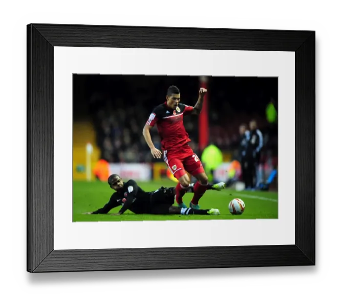 Framed Print : Bristol City's Matthew Briggs Fouls by Pritchard in Championship Clash Framed Print : Bristol City's Matthew Briggs Fouls by Pritchard in Championship Clash