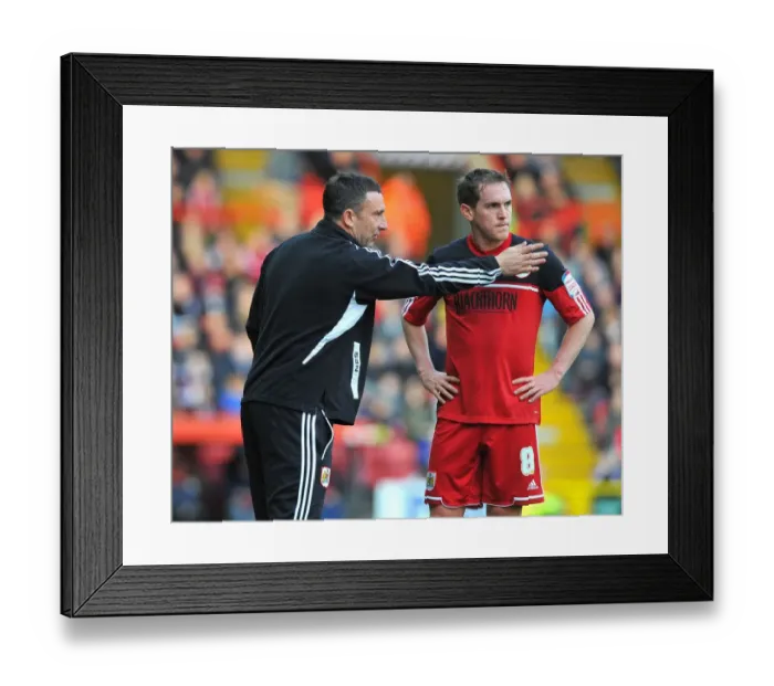 Framed Print : Bristol City FC: Derek McInnes and Neil Kilkenny Strategize Tactics During Championship Match vs Blackpool (17th November 2012) Framed Print : Bristol City FC: Derek McInnes and Neil Kilkenny Strategize Tactics During Championship Match vs Blackpool (17th November 2012)