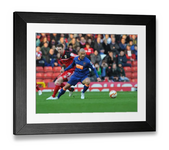 Framed Print : Battling for Supremacy: Pearson vs. Phillips in the Championship Clash between Bristol City and Blackpool Framed Print : Battling for Supremacy: Pearson vs. Phillips in the Championship Clash between Bristol City and Blackpool