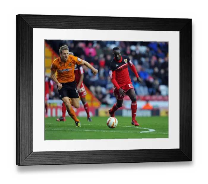 Framed Print : Adomah vs. Berra: Intense Battle for Possession in Bristol City vs. Wolverhampton Wanderers Championship Clash, December 2012 Framed Print : Adomah vs. Berra: Intense Battle for Possession in Bristol City vs. Wolverhampton Wanderers Championship Clash, December 2012