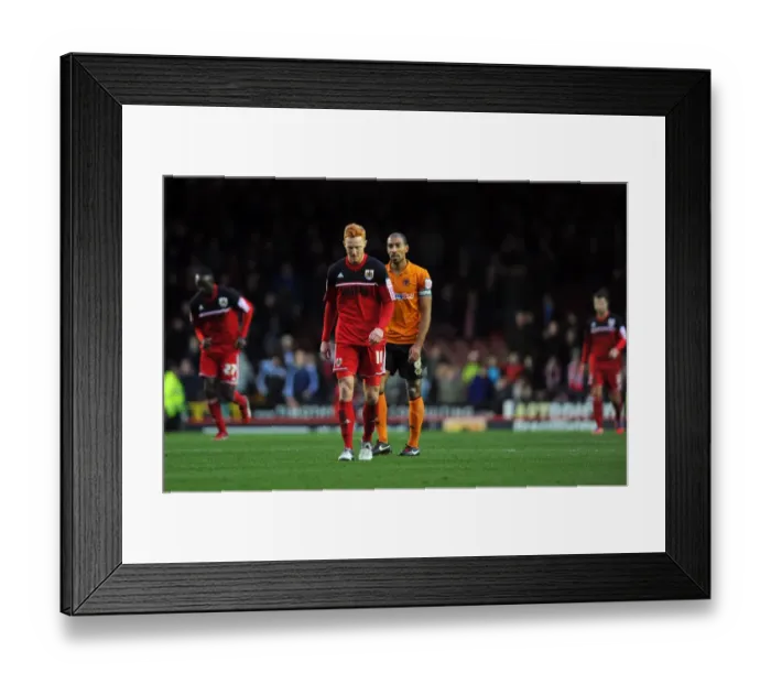 Framed Print : Bristol City Players Exit Dejected: 4-0 Half-Time Score vs. Wolves