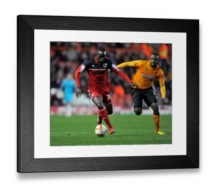 Framed Print : Adomah vs Ebanks-Blake: Intense Battle for Ball Possession during Bristol City vs Wolves Championship Match, 1st December 2012 Framed Print : Adomah vs Ebanks-Blake: Intense Battle for Ball Possession during Bristol City vs Wolves Championship Match, 1st December 2012
