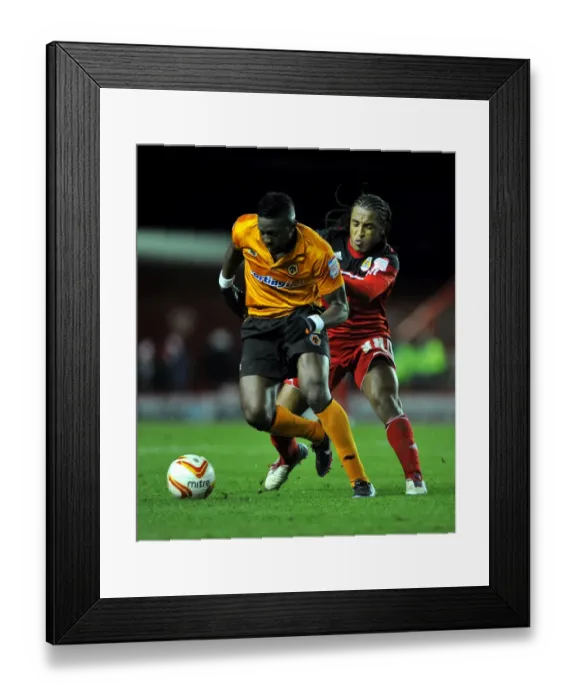 Framed Print : Battling for Supremacy: Neil Danns vs. Bakary Sako in the Championship Clash between Bristol City and Wolverhampton Wanderers Framed Print : Battling for Supremacy: Neil Danns vs. Bakary Sako in the Championship Clash between Bristol City and Wolverhampton Wanderers