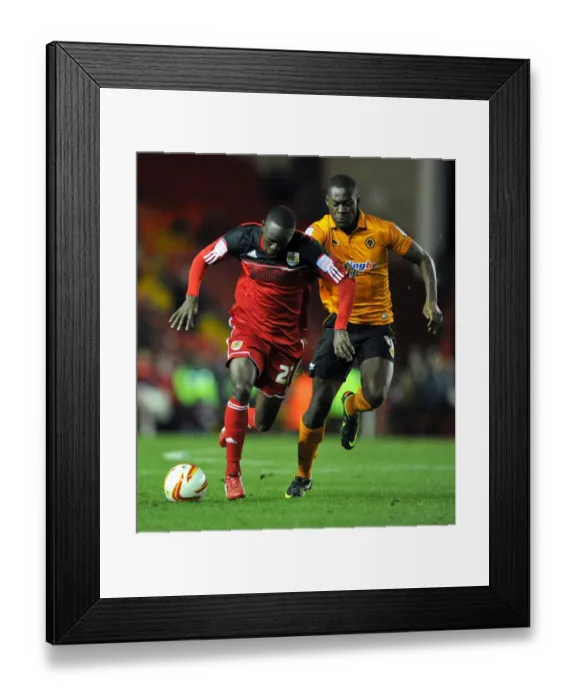 Framed Print : Adomah vs. Nouble: Battle for Supremacy in Bristol City vs. Wolves Championship Clash Framed Print : Adomah vs. Nouble: Battle for Supremacy in Bristol City vs. Wolves Championship Clash