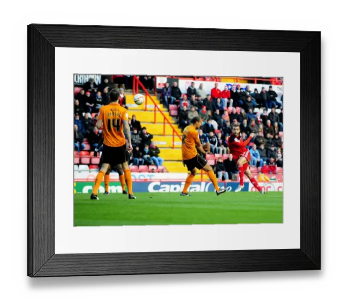 Framed Print : Bristol City's Liam Fontaine Unleashes a Powerful Volley Against Wolves in Championship Clash Framed Print : Bristol City's Liam Fontaine Unleashes a Powerful Volley Against Wolves in Championship Clash