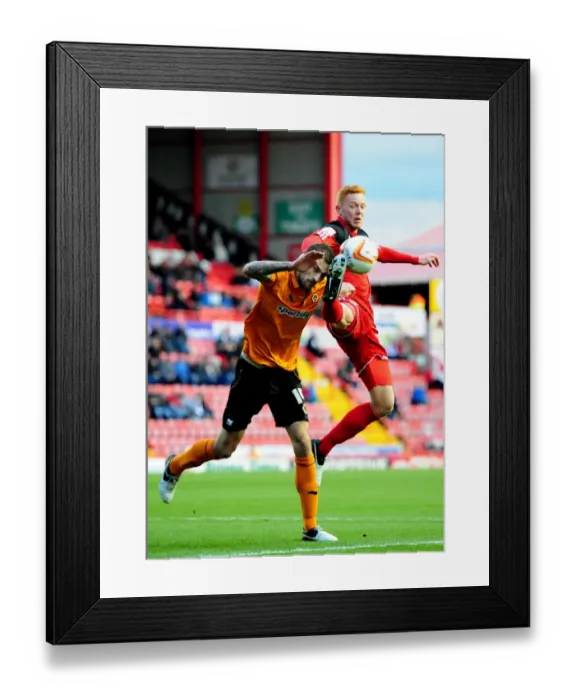 Framed Print : Battling for Supremacy: Johnson vs. Taylor in the Heights of Ashton Gate Framed Print : Battling for Supremacy: Johnson vs. Taylor in the Heights of Ashton Gate