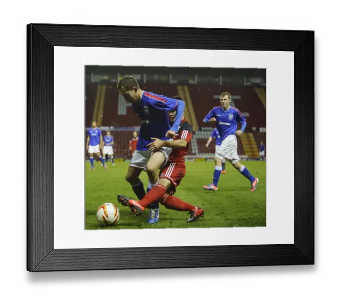 Framed Print : Intense Battle: Miles John of Bristol City U18s vs Ipswich Town U18 in FA Youth Cup Third Round Proper at Ashton Gate Framed Print : Intense Battle: Miles John of Bristol City U18s vs Ipswich Town U18 in FA Youth Cup Third Round Proper at Ashton Gate