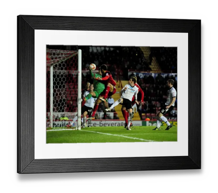 Framed Print : Bristol City vs Derby County: Liam Fontaine's Header Thwarted by Adam Legzdins Framed Print : Bristol City vs Derby County: Liam Fontaine's Header Thwarted by Adam Legzdins