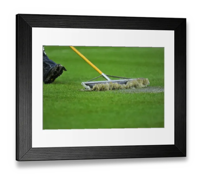 Framed Print : Bristol City vs. Watford: A Winter's Day Battle - Refree Calls Off Match Amidst Grounds Crew's Relentless Efforts