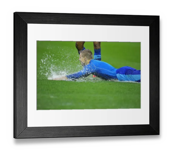 Framed Print : Matej Vydra Slides on Flooded Ashton Gate: Championship Match Between Bristol City and Watford Halted (December 2012)
