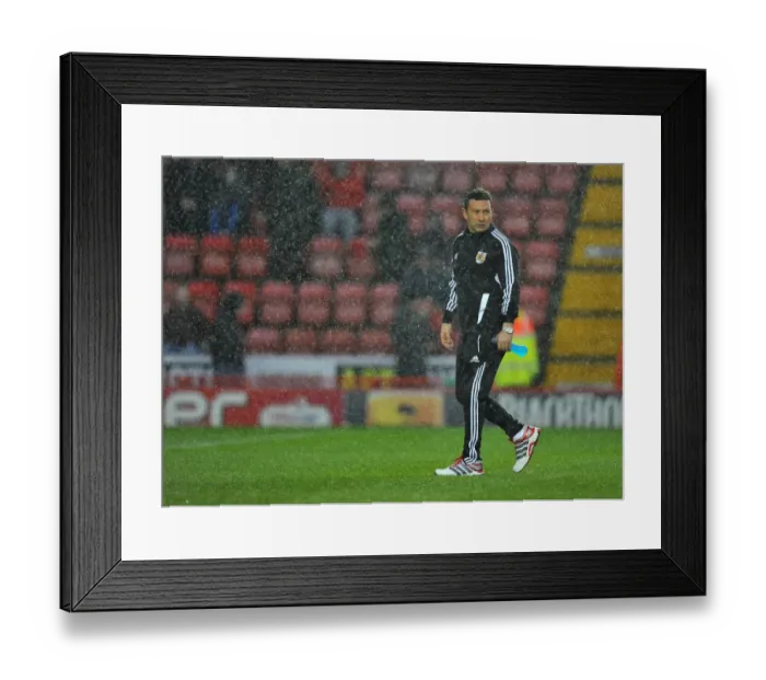 Framed Print : Bristol City vs. Watford: Derek McInnes Inspects the Pitch Before Referees Call Off Championship Match (December 26, 2012) Framed Print : Bristol City vs. Watford: Derek McInnes Inspects the Pitch Before Referees Call Off Championship Match (December 26, 2012)