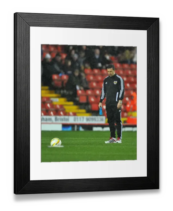 Framed Print : Derek McInnes Examines Unplayable Floodlit Pitch as Championship Match Between Bristol City and Watford is Abandoned (December 2012) Framed Print : Derek McInnes Examines Unplayable Floodlit Pitch as Championship Match Between Bristol City and Watford is Abandoned (December 2012)