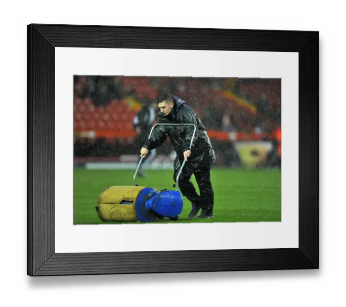 Framed Print : Bristol City vs. Watford: A Snowy Showdown - Referees Call Off Championship Match Amidst Grounds Crew's Relentless Efforts