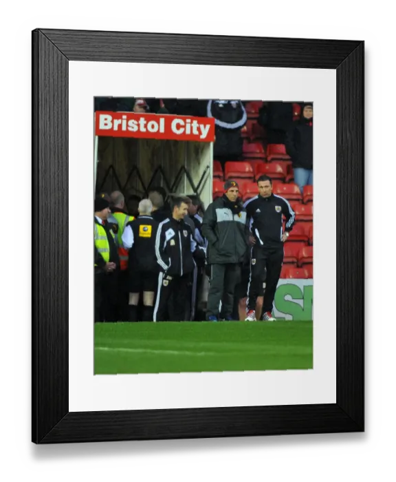 Framed Print : Bristol City vs. Watford: McInnes and Zola Discuss Potential Game Postponement (December 2012) Framed Print : Bristol City vs. Watford: McInnes and Zola Discuss Potential Game Postponement (December 2012)