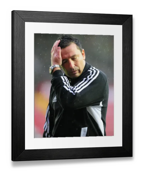 Framed Print : Championship Match Postponed: Derek McInnes Braves the Rain at Ashton Gate Framed Print : Championship Match Postponed: Derek McInnes Braves the Rain at Ashton Gate