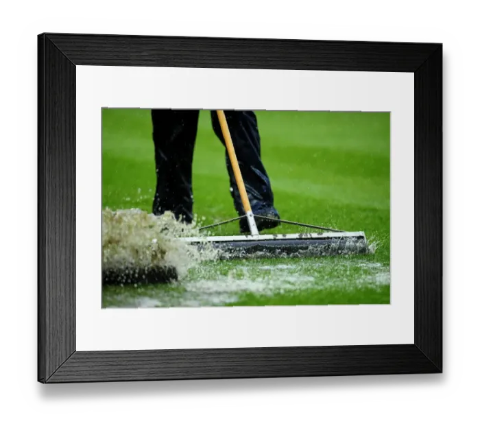 Framed Print : Bristol City vs. Watford: Groundsman Battles Winter Conditions Ahead of Championship Match