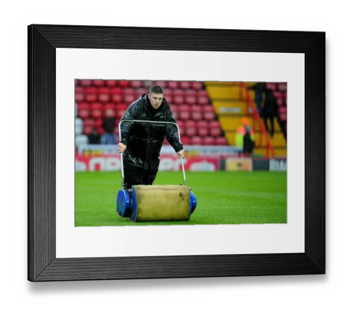 Framed Print : Bristol City vs. Watford: Defying Winter - The Groundsman's Battle