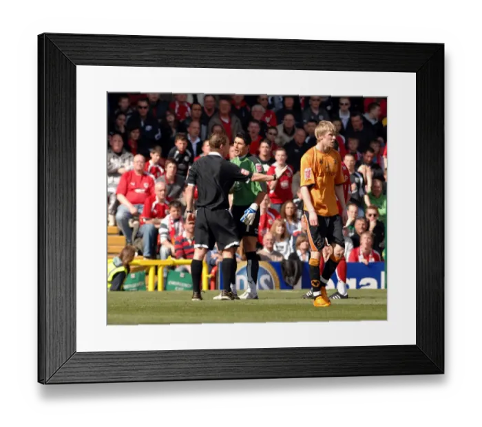 Framed Print : Intense Moment: Adriano Basso Faces Off Against Wolverhampton Wanderers