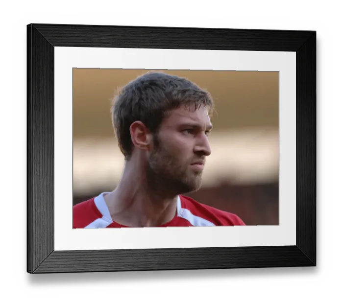Framed Print : Intense Moment: Jamie McCombe Faces Off Against Wolverhampton Wanderers
