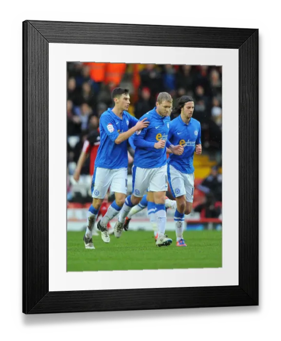 Framed Print : Grant McCann's Jubilant Moment: Peterborough United Celebrate Win Against Bristol City, 29 December 2012 Framed Print : Grant McCann's Jubilant Moment: Peterborough United Celebrate Win Against Bristol City, 29 December 2012
