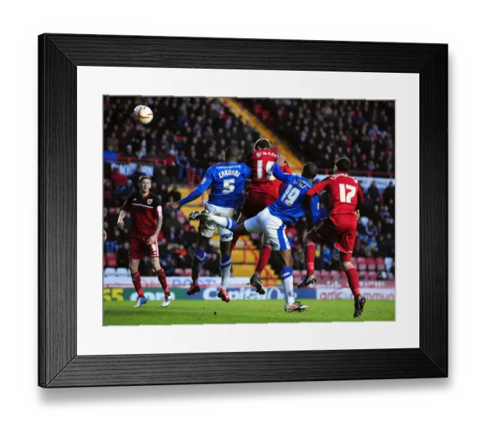 Framed Print : Bristol City's Stephen McManus Scores the Winning Header Against Peterborough United in Championship Match, December 2012 Framed Print : Bristol City's Stephen McManus Scores the Winning Header Against Peterborough United in Championship Match, December 2012