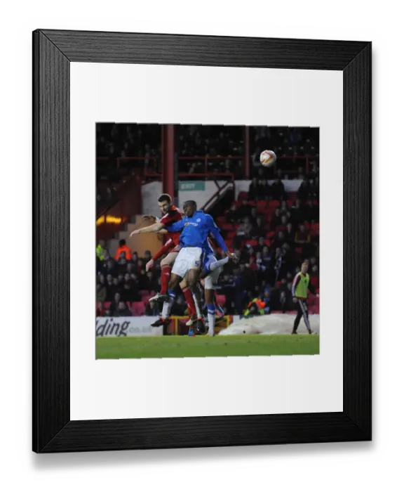 Framed Print : Bristol City's Stephen McManus Heads in Third Goal vs Peterborough in Championship Match at Ashton Gate, 2012