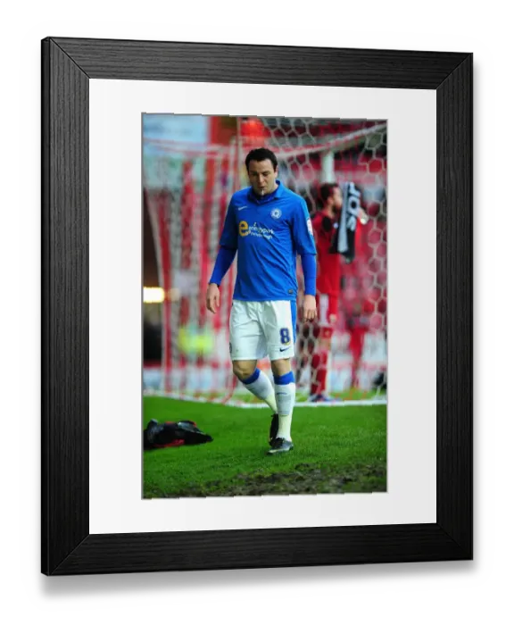 Framed Print : Disappointment for Peterborough's Lee Tomlin: Red Card at Ashton Gate (Bristol City vs Peterborough, December 2012)