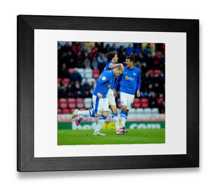 Framed Print : Championship Clash: McCann's Goal Celebration for Peterborough at Ashton Gate Framed Print : Championship Clash: McCann's Goal Celebration for Peterborough at Ashton Gate