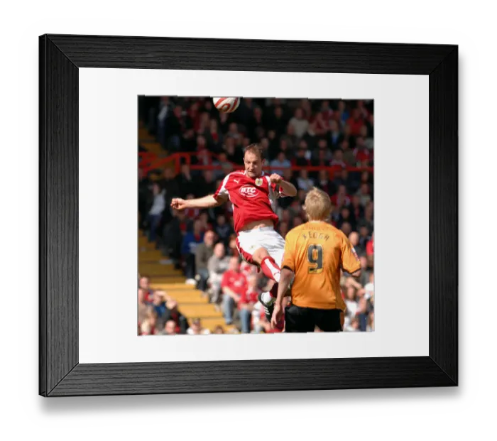 Framed Print : Football Rivalry: Louis Carey vs. Wolverhampton Wanderers - A Legendary Clash: The Intense Head-to-Head