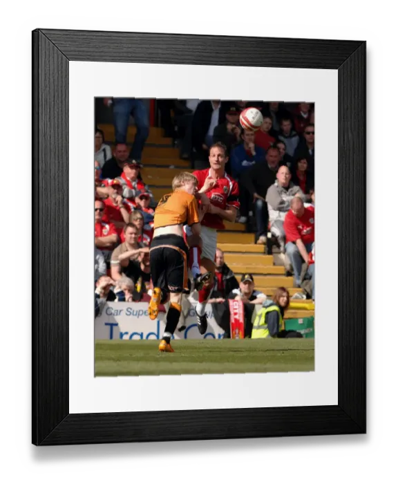 Framed Print : Bristol City's Unyielding Defender: Louis Carey Faces Off Against Wolverhampton Wanderers Framed Print : Bristol City's Unyielding Defender: Louis Carey Faces Off Against Wolverhampton Wanderers