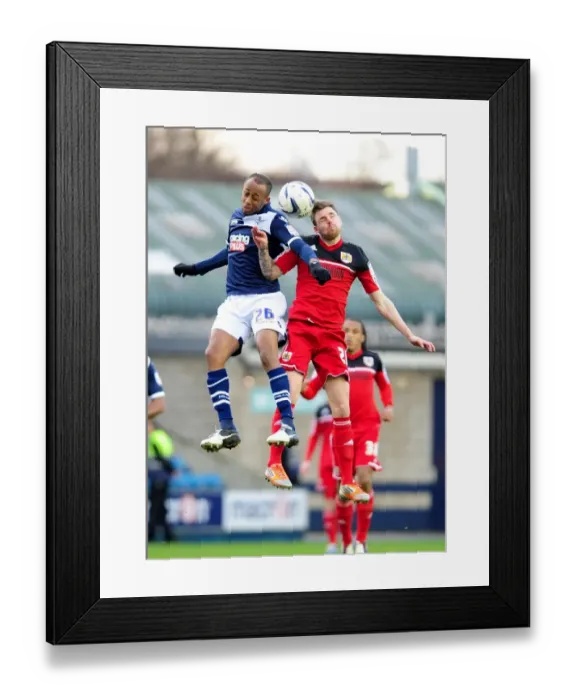 Framed Print : Battling for Supremacy: Paul Anderson vs. Nadjim Abdou in the Championship Clash between Millwall and Bristol City Framed Print : Battling for Supremacy: Paul Anderson vs. Nadjim Abdou in the Championship Clash between Millwall and Bristol City