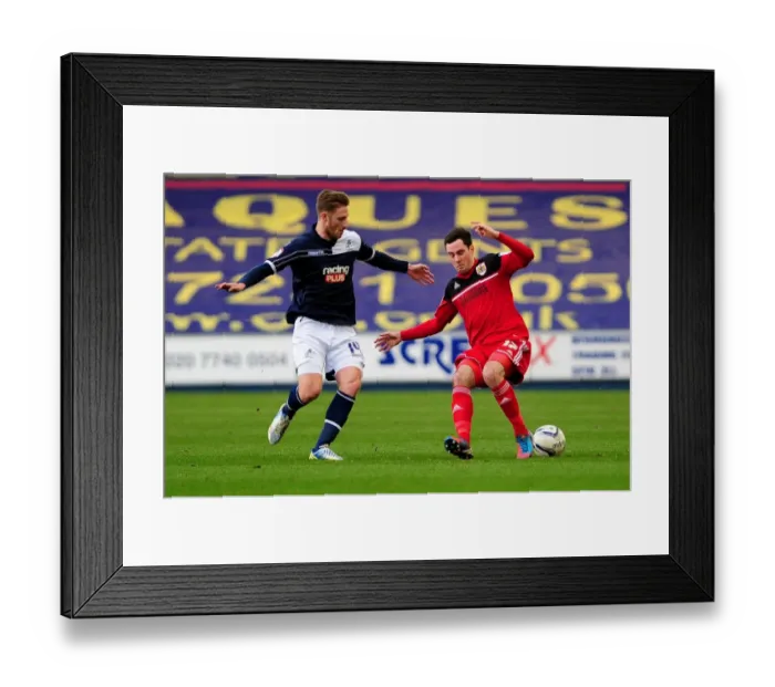 Framed Print : Championship Showdown: Millwall's James Henry Stops Gregg Cunningham of Bristol City