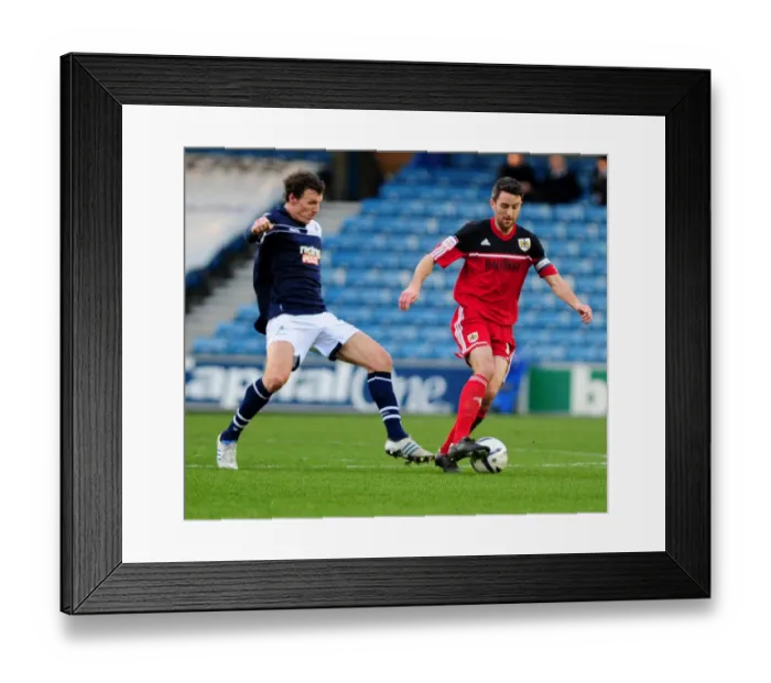 Framed Print : Clash at The Den: Millwall's Henderson Harasses Bristol City's Skuse Framed Print : Clash at The Den: Millwall's Henderson Harasses Bristol City's Skuse