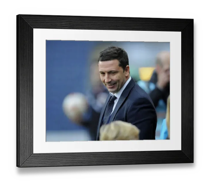 Framed Print : Derek McInnes Smile: A Young Mascot's Moment at Ewood Park during Blackburn vs. Bristol City (FA Cup)