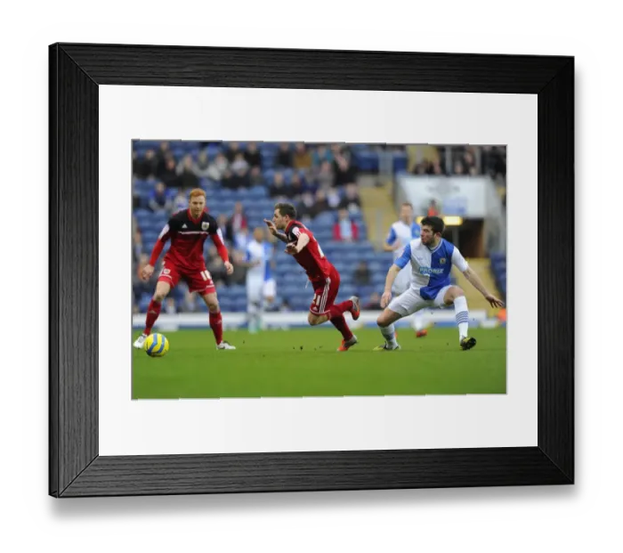Framed Print : Bristol City's Paul Anderson Fouled by Grant Hanley during FA Cup Match vs Blackburn Rovers Framed Print : Bristol City's Paul Anderson Fouled by Grant Hanley during FA Cup Match vs Blackburn Rovers
