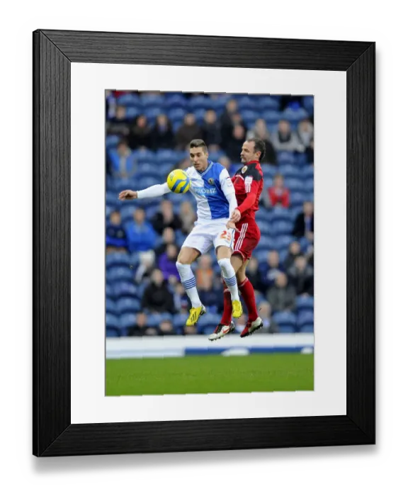 Framed Print : Battling for Supremacy: Carey vs. Rochina in FA Cup Clash between Blackburn and Bristol City
