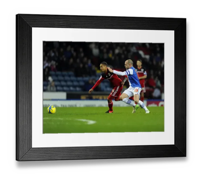 Framed Print : Bobby Reid's Game-Changing Moment: Stealing the Ball from Danny Murphy in the FA Cup Match between Blackburn Rovers and Bristol City, January 2013