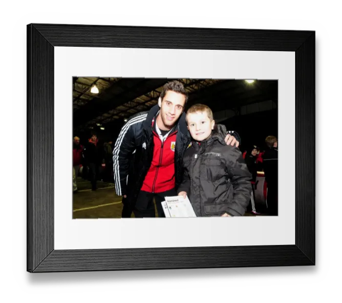 Framed Print : Bristol City's Sam Baldock and Young Fan Share a Moment at Ashton Gate during Bristol City vs Leicester City (January 12, 2013)